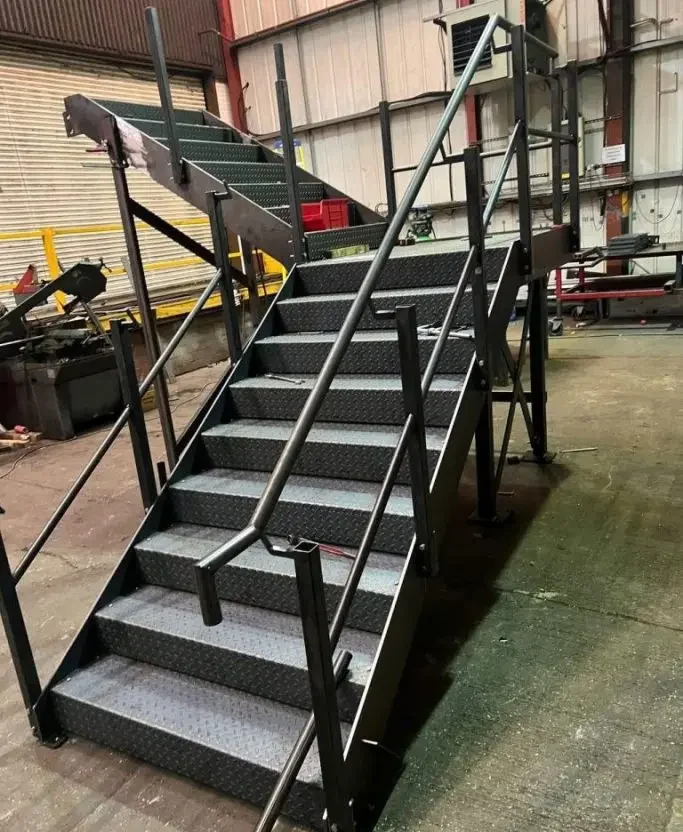 Bespoke mezzanine stairs fabricated by Gateway Fabricaations